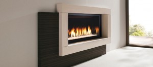 Small and elegant Infinite series gas fireplace from Marquis - featured in an Ottawa family room