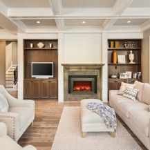Wonderfully neutral living space centered around a cozy Amantii electric fireplace