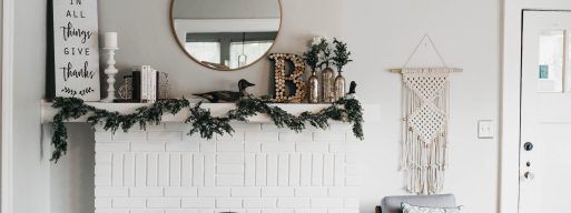 A beautifully decorated fireplace mantel in a home.